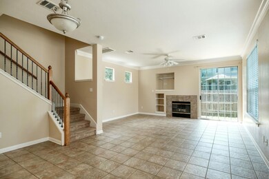 Unfurnished living room featuring built in shelve