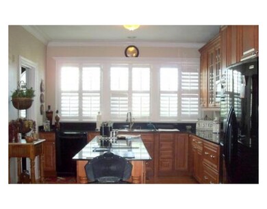 Photo. The kitchen has ample counter tops and cabi