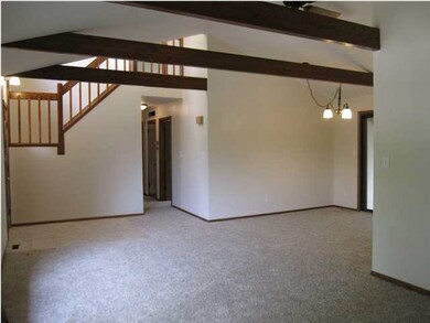 VIEW OF THE LIVING ROOM AND DINING ROOM