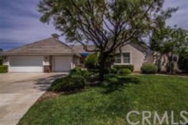 Shade tree in the front yard. This home is complet