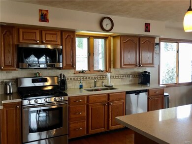 Dream kitchen comes fully applianced, granite coun