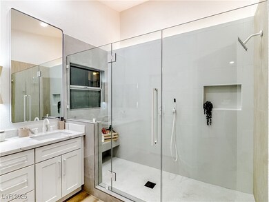 Full bath featuring vanity and a stall shower