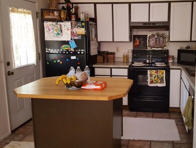 Functonal kitchen with island and pantry