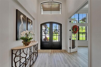 Expansive Foyer with 14 ft ceilings