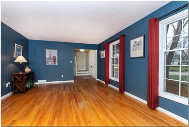 Beautiful hardwood floors in the spacious living room and the large formal dining with chair rail moldings