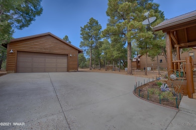 2 Car Garage and Expanded Parking Area