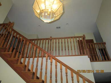stairway and chandelier