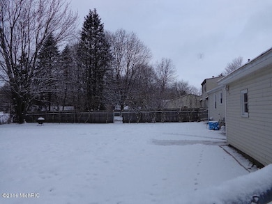 556 Netherfield St NW, Comstock Park, MI 49321 - photo 4