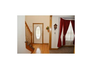 Inside front entrance.  Beautiful wood floors.  Ne