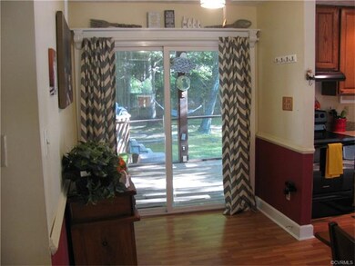 New sliding glass door leading out back to the HUG