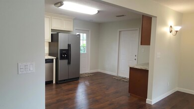 View of kitchen from dining area