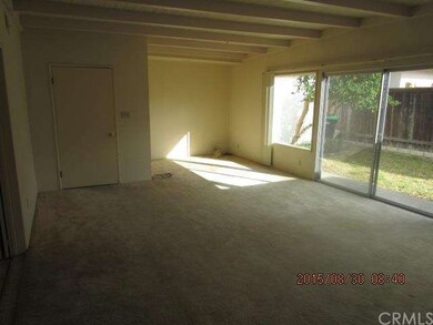 Living room with entry on left.