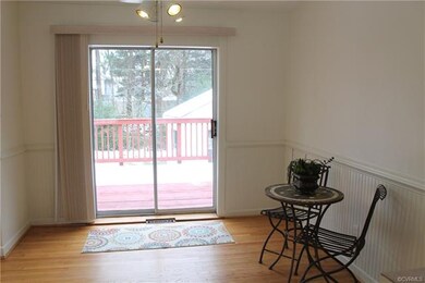 Dining room with sliding door access to the recent