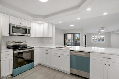 Kitchen featuring appliances with stainless steel