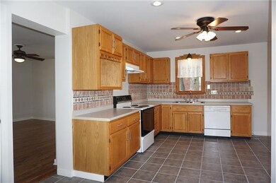 Kitchen and living room flow nicely together.