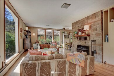 50's period fireplace with wood burning insert