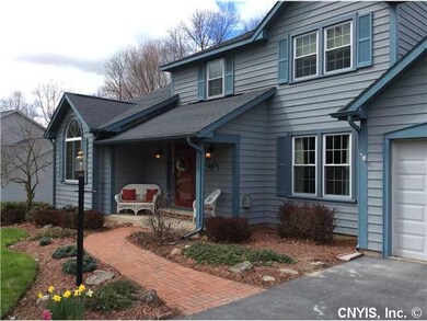 Exterior Front. Brick walkway welcomes you with cl