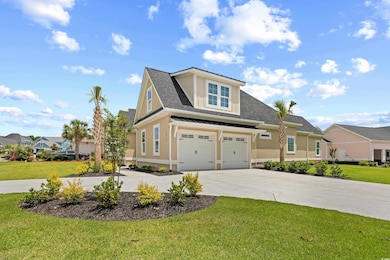 View of front of home featuring driveway, an attached two car garage, a front lawn, stucco siding and palm trees