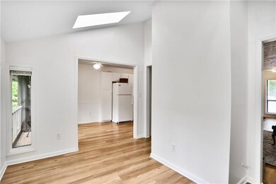 Bright and airy sunroom, with vaulted ceilings and
