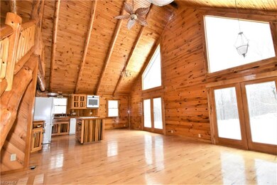 Spacious log home with customized wood finishes th