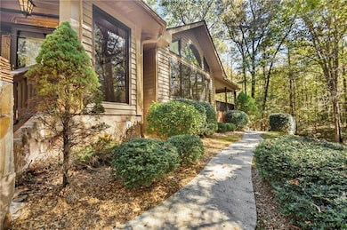 View of property exterior featuring a sidewalk