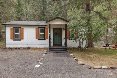 View of front of property featuring a shingled roof