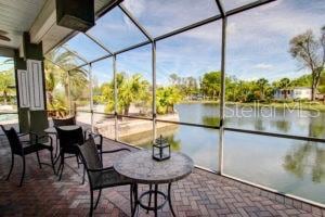 Enjoy life from the screen lanai of the Clubhouse overlooking the water.