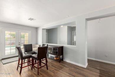Dining Area Overlooks Back Patio