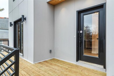 Front entryway, additional left door is off the di