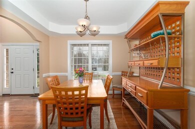 Dining room with arched doorway