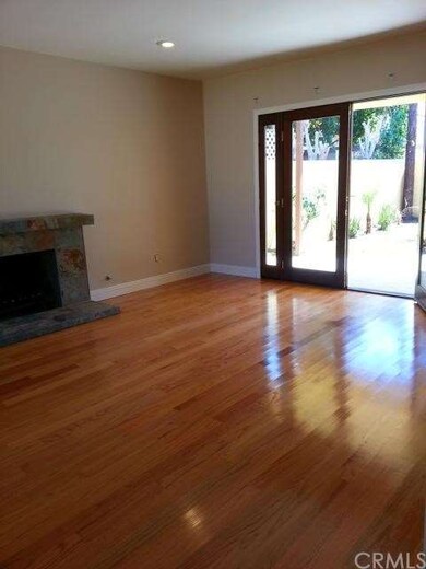 French doors leading out from living room to large