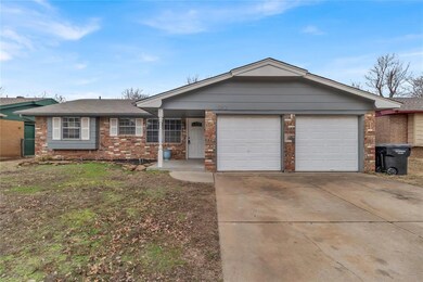 Ranch-style house featuring a garage