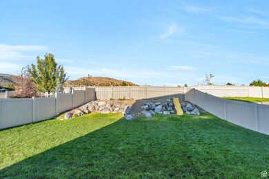 View of fenced backyard