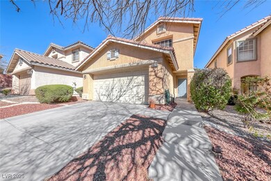 View of front facade featuring stucco siding, an a