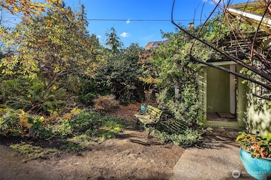 Large front yard with mature landscaping