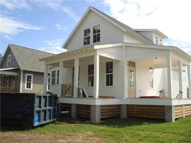 Exterior Front. Side porch will be screened, with 
