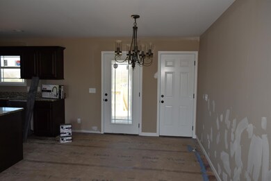 Dining area...kitchen to the left. Nice deck off the dining area