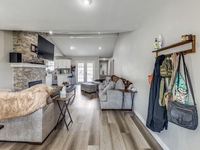 This spacious living area features an open floor p