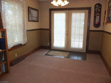 Formal dining room with French doors to the deck.