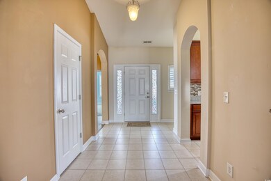 There is a half bathroom located off the foyer