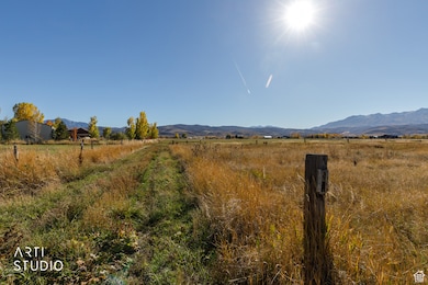 View of mountain background featuring rural landscape