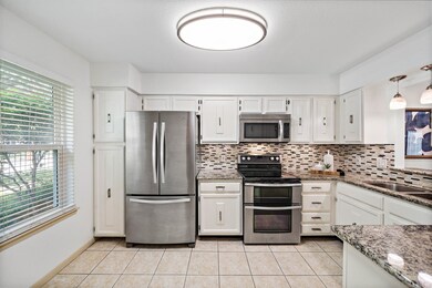 Updated kitchen with room for a breakfast table.