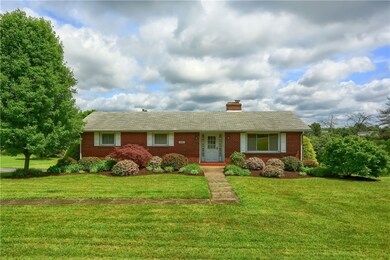 Three plus acres surround this brick, ranch home with generous room sizes, a finished lower level and a tranquil outdoor entertaining area.