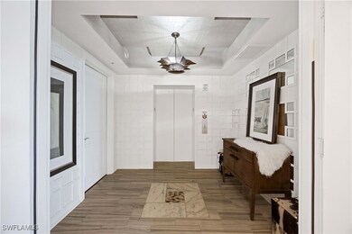 13675 Vanderbilt Dr unit 406, Naples, FL 34110 - photo 2