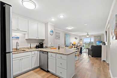 Kitchen with appliances with stainless steel finis