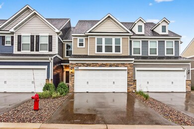 Welcome to 7816 Walnut Grove Way N a Pulte 2022 built townhome featuring updates throughout.