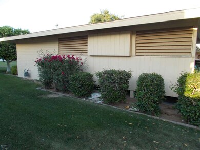 WEST SIDE OF CARPORT