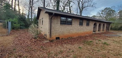 View of home's exterior featuring brick siding