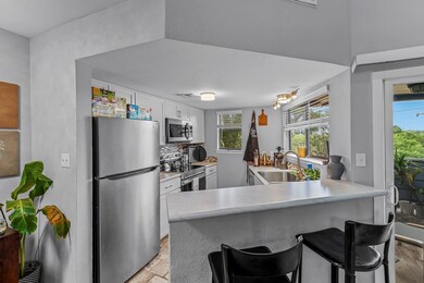 Kitchen featuring appliances with stainless steel