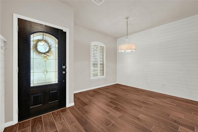 Spacious formal dining room that could easily be a
